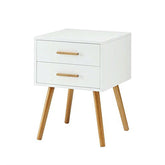 A white nightstand with two top drawers, providing a stylish and functional addition to any bedroom decor.